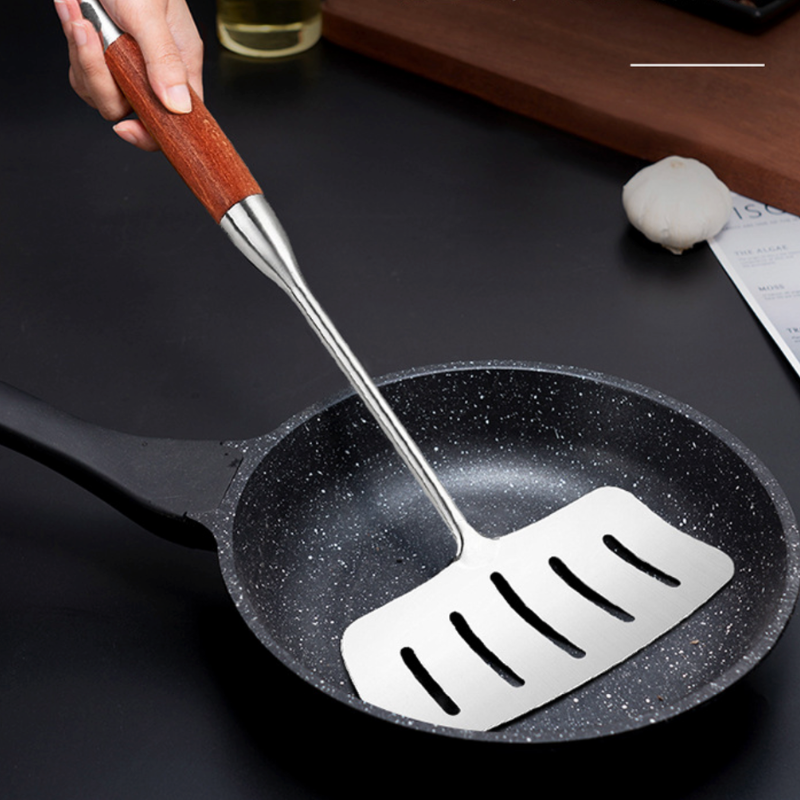 Spatule wok inox