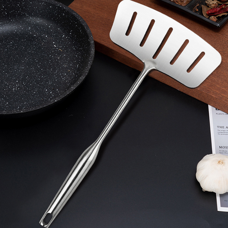 Spatule wok inox
