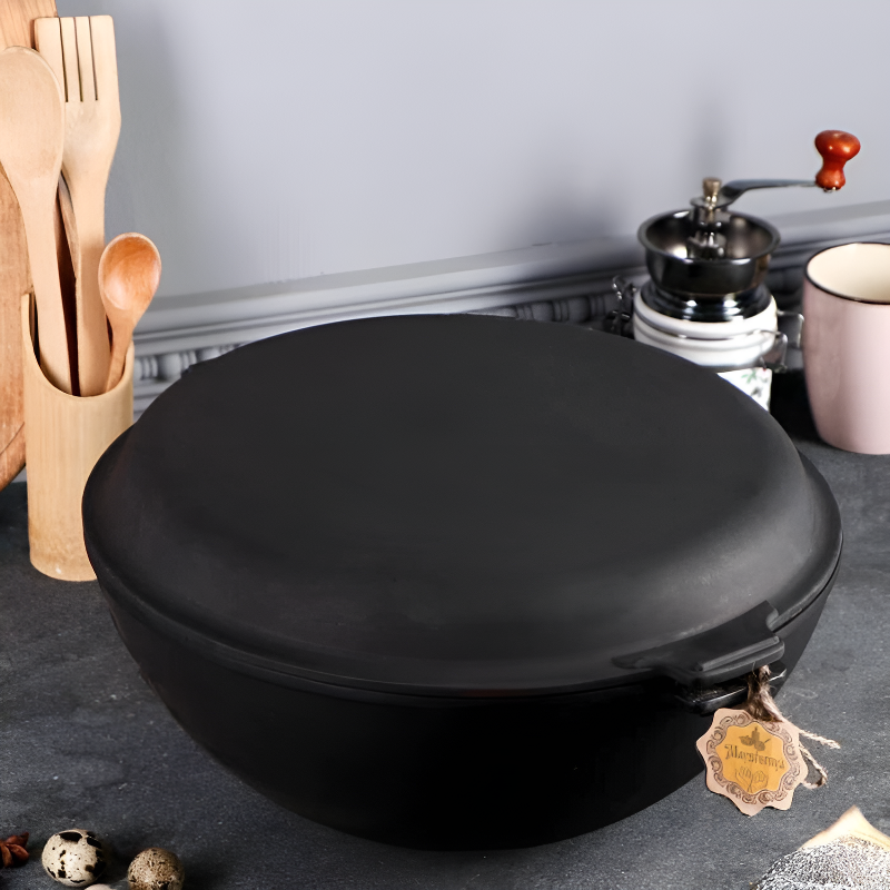 Wok Manaka en fonte avec couvercle, compatible tous feux.